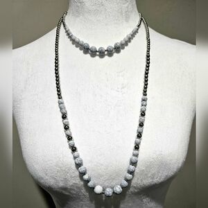 Charming Charlies 2 strand, adjustabl necklace with clasp closure.